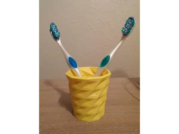 Shapeshifter Toothbrush Cup