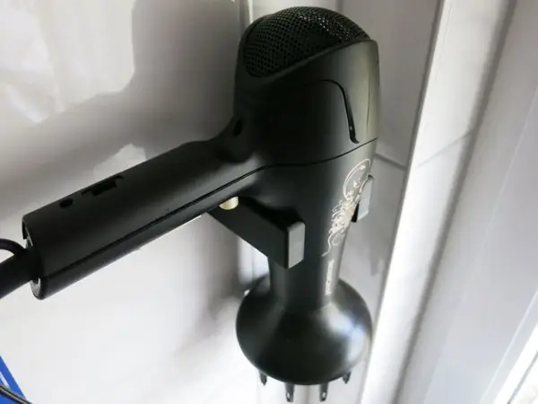 Parametric hair-dryer holder