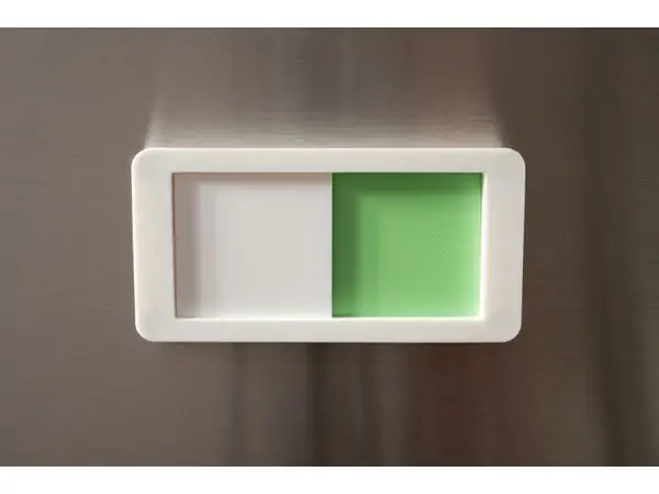 Dishwasher status slider, magnetic