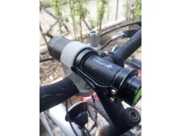 Flashlight bike holder