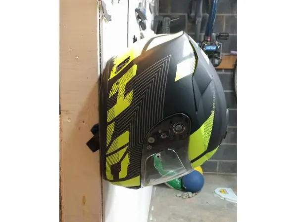 Wall mounted motorcycle helmet holder