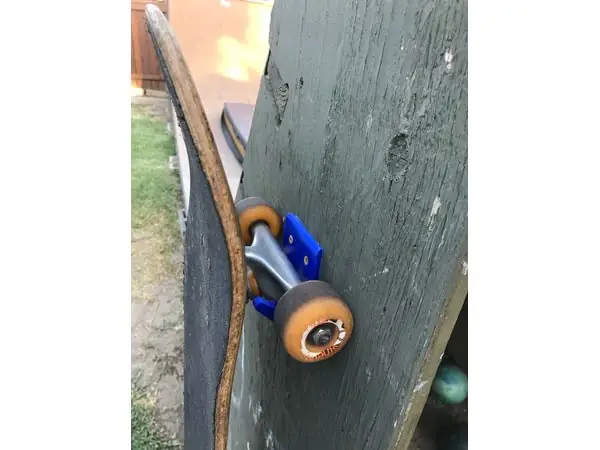 Happy skateboard wall hook