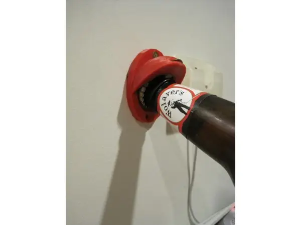 Wall mountable bottle opener