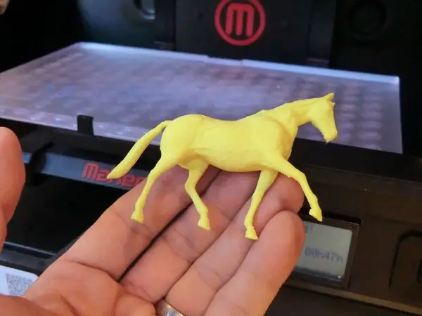 3D-printed toy horse figure (two halves)