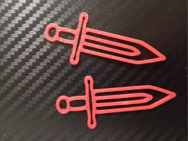 Paper clip sword