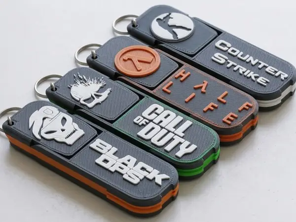 Llaveros Porta Celular Shooter