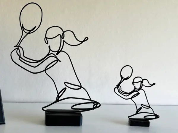 Female Tennis Player Line Art Sculpture