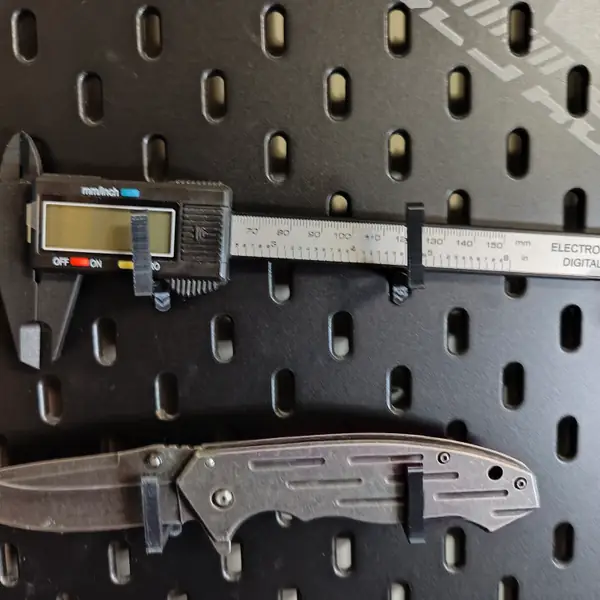 Single hole hook for Skadis