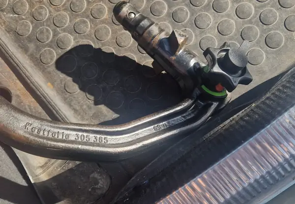 A protective cap for a Westfalia towbar lock