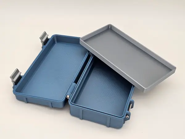 Rugged phone box with charger and accesory tray