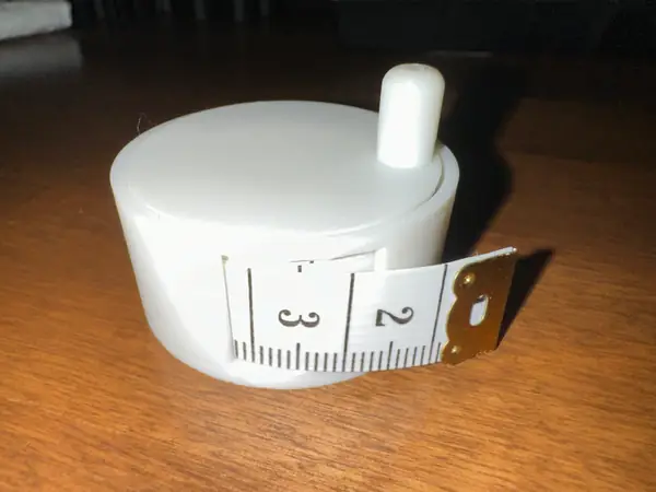 Measuring tape spool